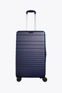 THE MEDIUM CHECK-IN ROLLER IN NAVY
